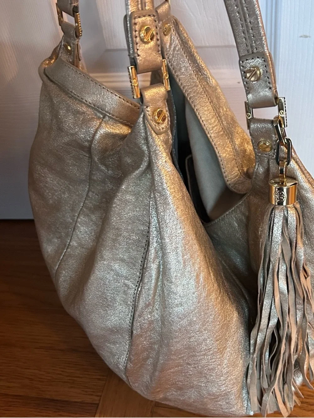 The Tory Burch Shimmer Gold Dean Hobo Bag MSRP 590.00